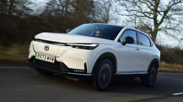 Honda e:Ny1 vs Hyundai Kona Electric - Honda e:Ny1 front tracking 